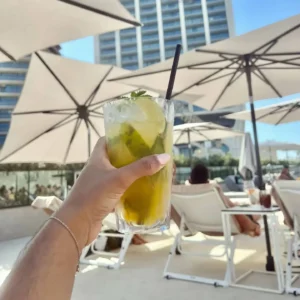 Refreshing cocktail by the pool at Flo Skypool Malta.