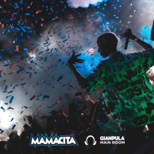 A vibrant dancer performing under confetti at Mamacita Reggaeton, Gianpula Malta.
