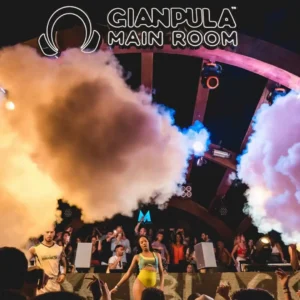 A dancer performs with smoke effects as the crowd goes wild at Mamacita Reggaeton, Gianpula Malta.