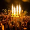 Partygoers dancing with flame effects at Move It! Event, Gianpula Malta