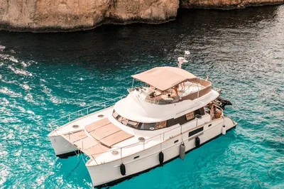 Private catamaran rental in Malta for a 7-hour cruise.