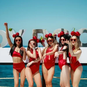 Cherry outfit dancers at Toy Room Beach Club Malta.