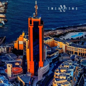A stunning aerial view showcasing the luxurious Twenty Two Malta located at Portomaso Business Tower, overlooking the beautiful cityscape.