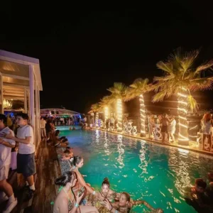 Exclusive pool party Malta at the Hugo Hotel Malta rooftop infinity pool.