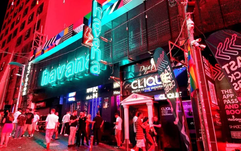 Paceville nightlife district in Malta at night with Havana and Clique clubs lit up by neon signs