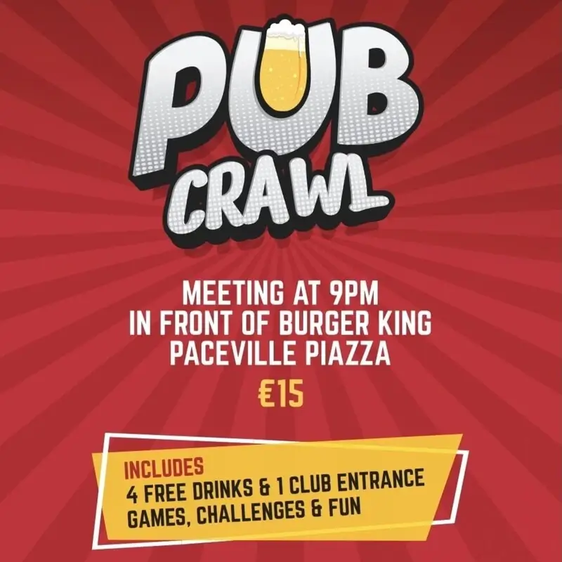 International group of friends with wristbands posing with a guide in Paceville, St Julian's, for the Malta Pub Crawl.